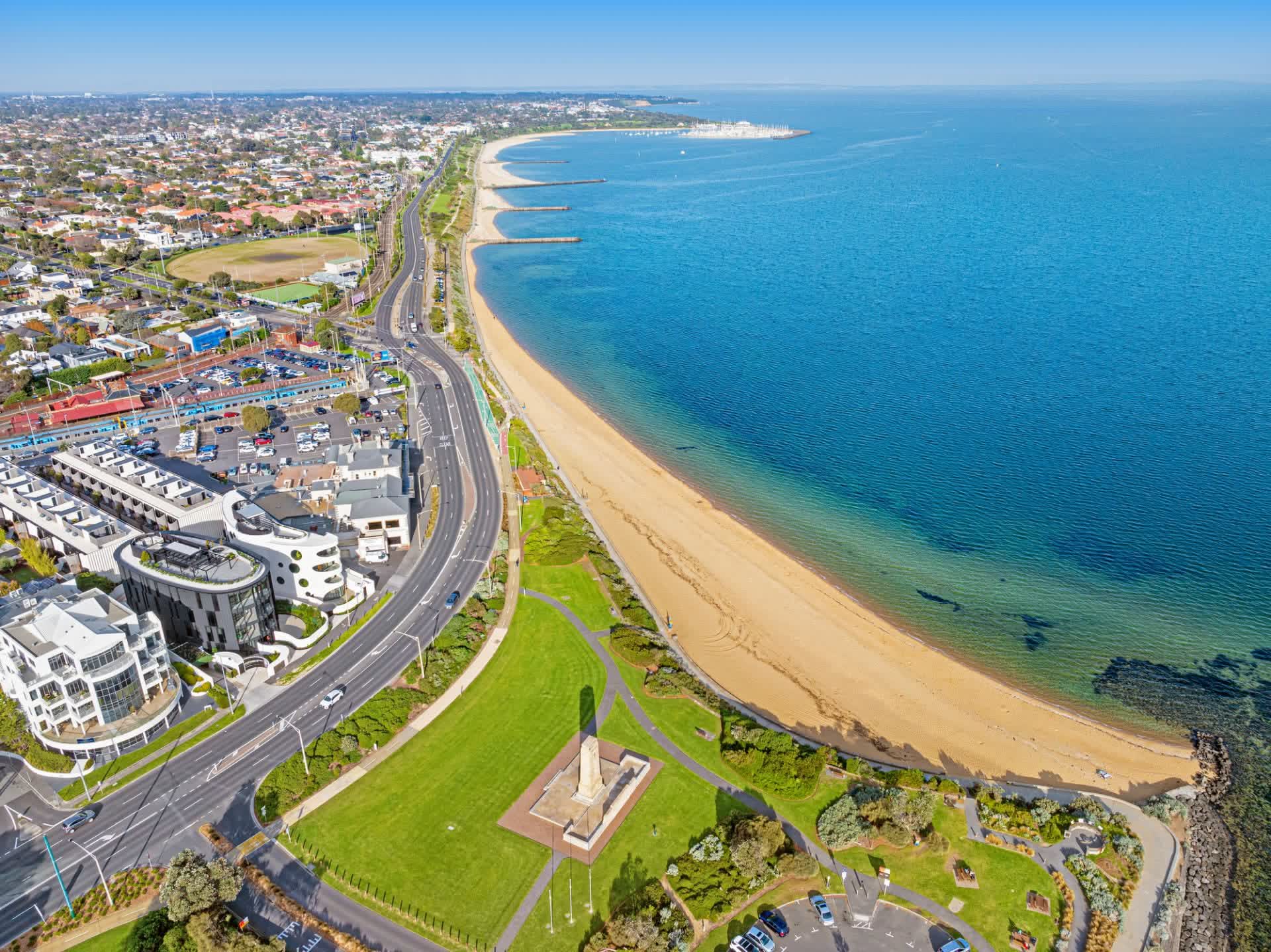 Aerial of the beach and the memorial at Green Point